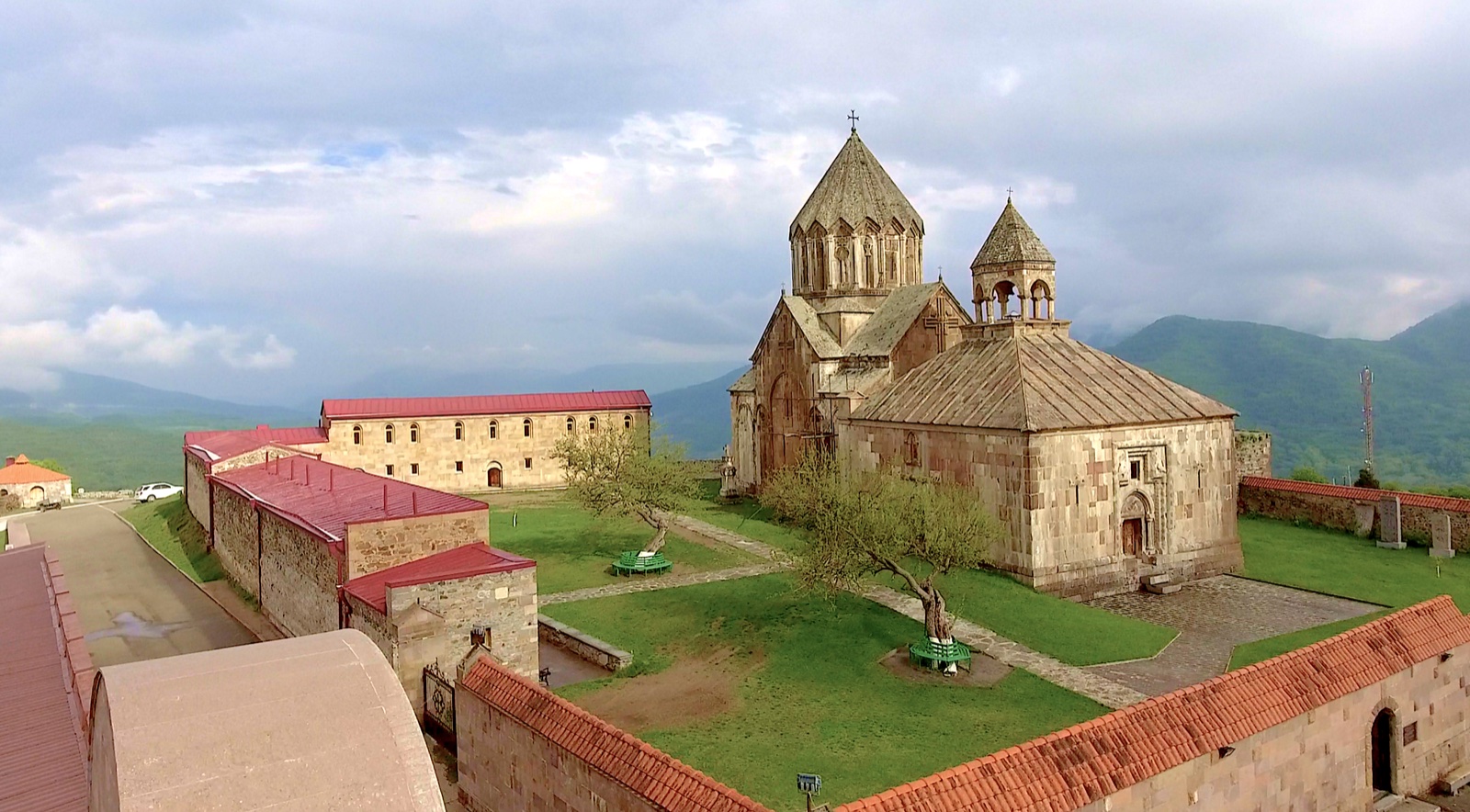 An Armenian monastery surrounded by green mountains